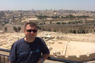 Fr. Tomasz Dzida, 34, associate pastor of Scarborough&#039;s Our Lady Queen of Poland, seen here in Jerusalem on Aug. 22, suffered a stroke while on pilgrimage in the Middle East, Aug. 27.