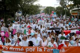 Thousands march against the legalization of same-sex marriage and to defend their interpretation of traditional family values Sept. 11 in Guadalajara, Mexico. Organizers plan a similar protest march Sept. 24 in Mexico City.