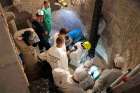 Workers inspect an ossuary at the Teutonic Cemetery at the Vatican in this July 20, 2019, file photo. The ossuary was inspected in the hope of finding the missing remains of a German princess and duchess and possibly the remains of Emanuela Orlandi, who disappeared in 1983. The Vatican prosecutor has opened a new investigation into the disappearance 40 years ago of Orlandi, the 15-year-old daughter of a Vatican employee.