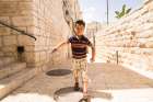 This Palestinian boy playing in the back alleys of Bethlehem may be able to dream of a better future, in part because of   over $2 million Development and Peace spent in 2015-2016 to support community development, health and education programs in the Palestinian Territories.