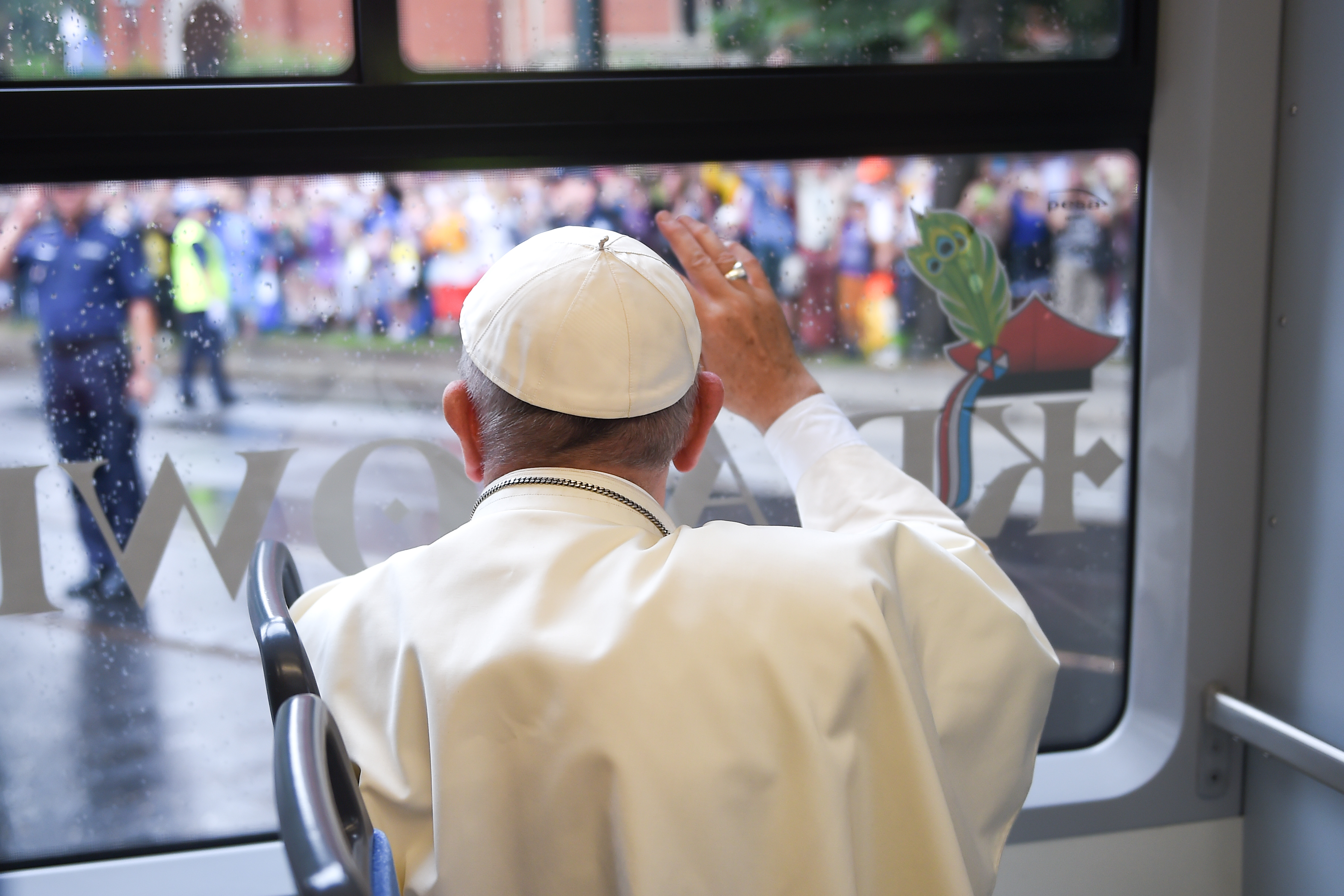 Pope riding a tram