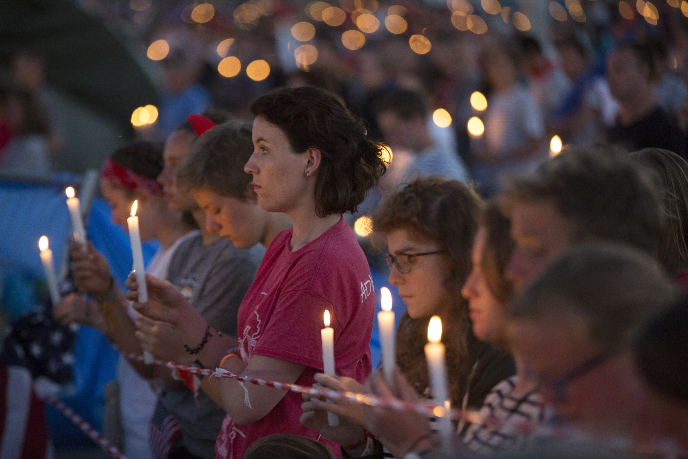 WYD pilgrims holding candles