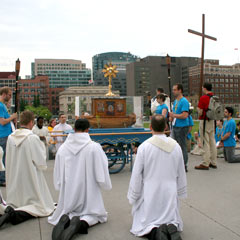 Catholic clergy and young adults paused to adore the Blessed Sacrament on Parliament Hill May 23, during a eucharistic procession that began in Gatineau-Hull and ended at Ottawa’s Notre-Dame Cathedral.