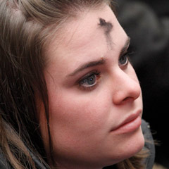 A young woman with ashes on her forehead attends Pope Benedict XVI's general audience in Paul VI hall at the Vatican March 9. Ash Wednesday marks the start of the penitential season of Lent. (CNS photo/Paul Haring)