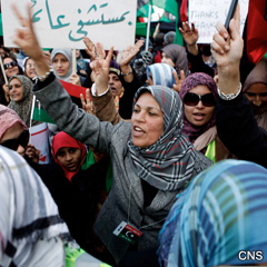 Women take part in a rally supporting coalition airstrikes in Libya at the rebel-held city of Benghazi March 23. (CNS photo/Finbarr O'Reilly)