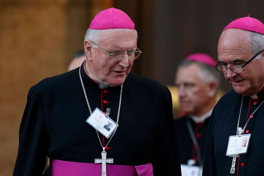 Melbourne Archbishops Denis Hart, left, see at the Vatican Oct 18, 2014. Archbishop Hart was one of four bishops from Victoria who signed a pastoral letter speaking out against the state’s proposals to legalize euthanasia.