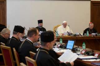 Pope Francis sits between Major Archbishop Sviatoslav Shevchuk of Kiev-Halych, head of the Ukrainian Catholic Church, and Cardinal Pietro Parolin, Vatican secretary of state, July 5, 2019, the opening of a two-day meeting in the Apostolic Palace. The meeting, which included members of the Ukrainian Catholic Church&#039;s permanent synod, its metropolitan archbishops and top officials of the Roman Curia, focused on the ministry of the church, particularly given the ongoing war in Eastern Ukraine. 