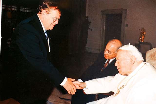 Senate Speaker Noel Kinsella, when he was Leader of the Opposition in the Senate, greets Pope John Paul II at a meeting in the Vatican in 2002.