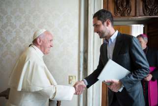 Pope Francis meets Kevin Systrom, co-founder and CEO of Instagram, during a private audience at the Vatican Feb. 26. 