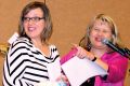 Anita Healy, left, shares the stage with Dorothy Pilarski at the Dynamic Women of Faith conference in Toronto.