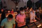People light candles after the first of the nine-day novena Masses for Simbang Gabi at the National Shrine of Our Mother of Perpetual Help in Manila, Philippines, Dec. 16. Filipinos are celebrating 500 years since Christianity was introduced to the nation.