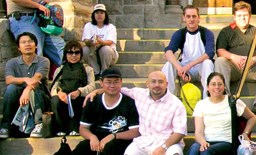 Every summer for 20 years, Lucio Abbruzzese, second from bottom right, has led groups through Toronto streets to give food to the homeless.