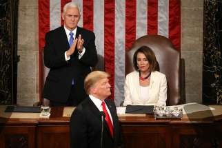  U.S. Vice President Mike Pence applauds and House Speaker Nancy Pelosi, D-Calif., looks on as President Donald Trump delivers his second State of the Union address Feb. 5, 2019, at the Capitol in Washington. During his speech Trump urged Congress to pass legislation that bans late-term abortion. 