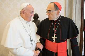 Pope Francis meets with French Cardinal Philippe Barbarin of Lyon at the Vatican March 18, 2019. Cardinal Barbarin said he was meeting with the pope to hand in his resignation after being convicted of covering up sexual abuse committed by a priest. 