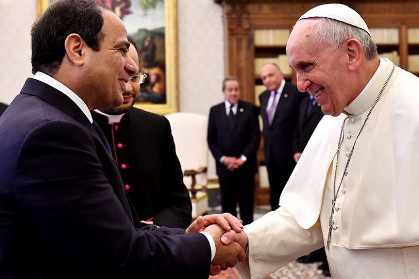 Pope Francis and Egypt&#039;s President Abdel Fattah al-Sisi shake hands during a private audience in 2014 at the Vatican. Accepting an invitation from Egypt&#039;s president and top religious leaders, Pope Francis will visit Cairo April 28-29.