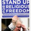 Dan Cumberledge, a parishioner of Nativity of the Blessed Virgin Mary Church in Brockport, N.Y., holds a rosary and a sign as he takes part in a “Stand Up for Religious Freedom” rally. On May 14, the CCCB issues a Pastoral Letter on Freedom of Conscience and Religion.