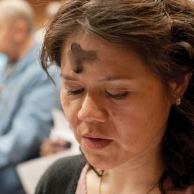 A woman prays during Ash Wednesday Mass in Washington. The 40 days of Lent are a time of spiritual renewal in preparation for Easter, but they also are a time to recognize that evil is at work in the world and even the Catholic Church faces temptations, Pope Benedict XVI said. 