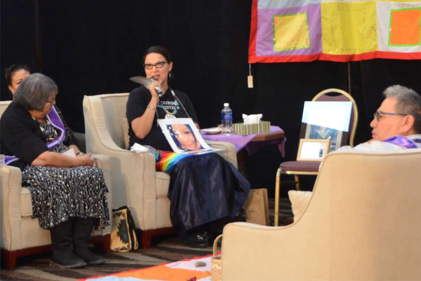 Melanie Dene is pictured at the National Inquiry Into Missing and Murdered Indigenous Women and Girls during public hearings in Edmonton, Alberta, Nov. 7.
