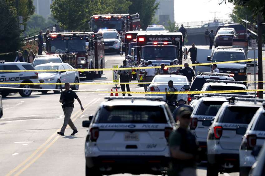 First responders are seen early June 14 after U.S. House Majority Whip Steve Scalise, R-La., was shot while practicing baseball, according to news reports. Multiple reports said two U.S. Capitol Police officers who were part of the Catholic congressman&#039;s protective detail also were shot.