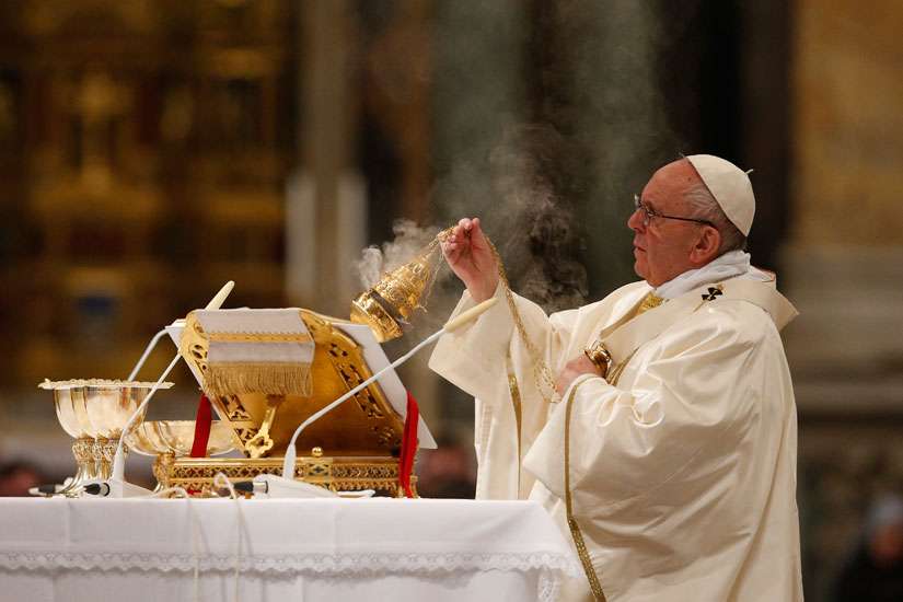 Pope Francis uses incense as he celebrates a Mass marking the closing of the Dominican order&#039;s 800th anniversary celebrations at the Basilica of St. John Lateran in Rome Jan. 21.