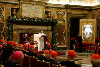 Pope Francis speaks during his annual audience to give Christmas greetings to members of the Roman Curia at the Vatican Dec. 21, 2019.