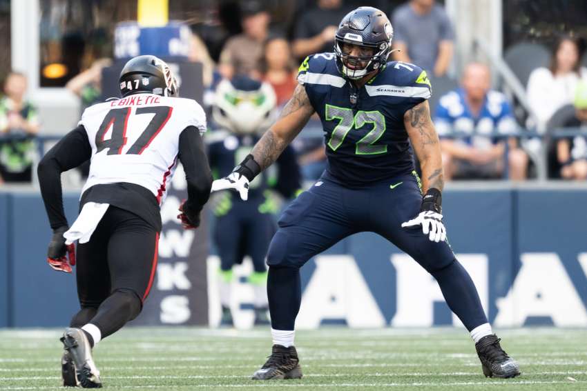 Seattle Seahawks No. 72, offensive tackle Abraham ”Abe“ Lucas — a self-described ”hard-core Catholic“ — is pictured in 2022 during a game against the Atlanta Falcons.