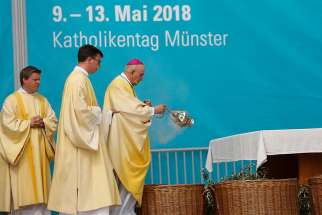Bishop Felix Genn of Munster, Germany, swings a censer as he celebrates Mass during Catholic Church Day May 10, 2018. The German Catholic Church is &quot;in deep distress,&quot; said Thomas Sternberg, president of the Central Committee of German Catholics. 