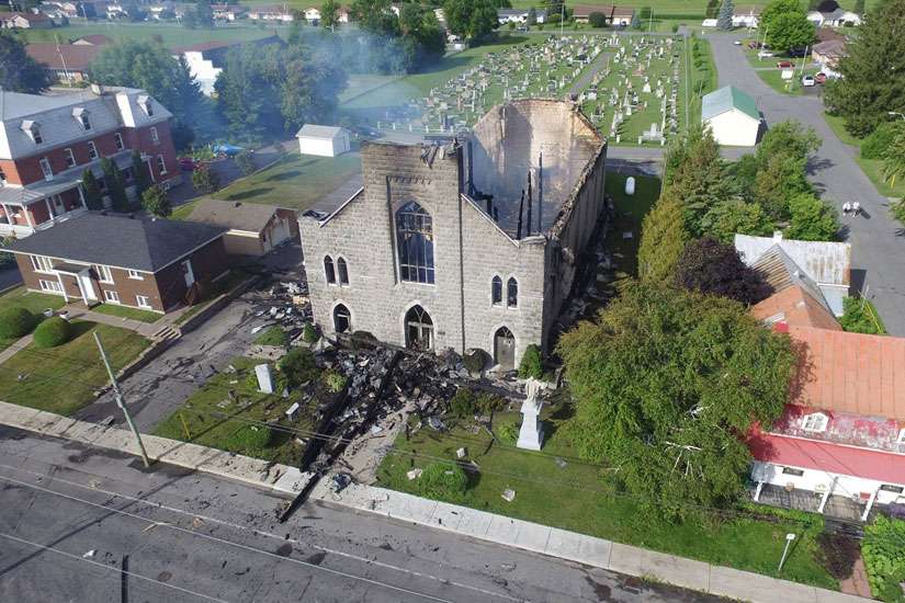 The aftermath of the church fire in St. Isidore, Ontario, July 24, 2016. 