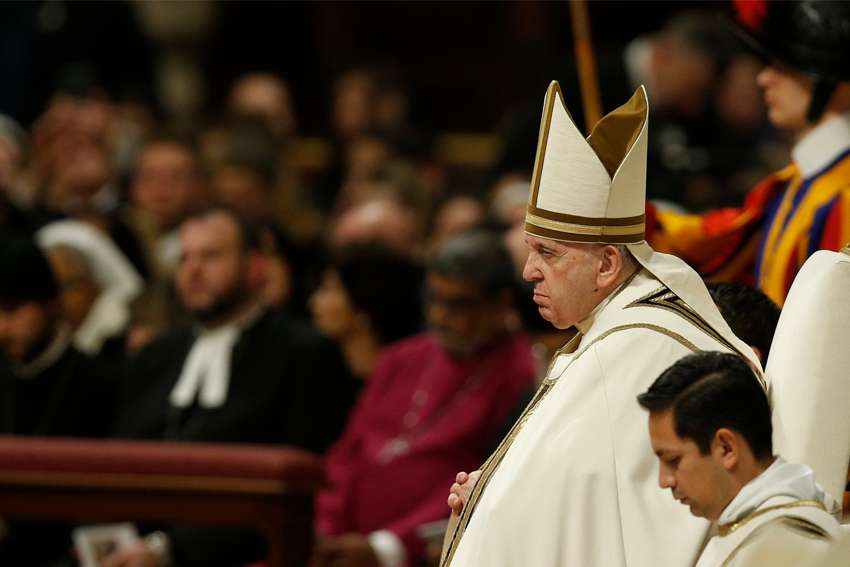 Pope Francis celebrates Christmas Eve Mass in St. Peter&#039;s Basilica at the Vatican Dec. 24, 2022.