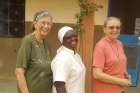 Three Marianite Sisters: Suellen Tennyson, Pascaline Tougma and Pauline Dourin, are pictured in an undated photo near the clinic where they serve in Yago, Burkina Faso. Sister Tennyson, 83, an American, was kidnapped late April 4 or early April 5 after armed attackers broke into the convent on the parish compound.