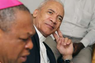 Retired Bishop John H. Ricard of Pensacola-Tallahassee, Florida, is pictured in a 2010 photo. When he was growing up in segregated Baton Rouge, La. the threat of being pulled over by police and arrested for something that even &quot;hinted of going beyond the status quo&quot; was very real, the bishop said in an interview.