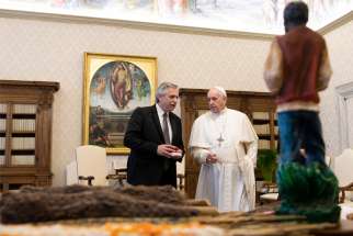 Pope Francis speaks with Argentine President Alberto Fernandez during a private audience at the Vatican Jan. 31, 2020.