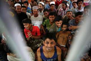 Human trafficking victims from Myanmar are held in a detention cell near the Thailand-Malaysian border, Feb. 13, 2014.