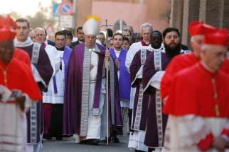 Pope Francis arrives in procession to celebrate Ash Wednesday Mass at the Basilica of Santa Sabina in Rome Feb. 26, 2020.