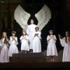 The cast of The Christmas Story sing “Hark the Herald Angels Sing” at a dress rehearsal. The play has been performed at the Church of the Holy Trinity since 1938.