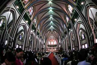 People gather inside St. Mary&#039;s Cathedral in 2011 in Yangon, Myanmar. Church sources say they expect Pope Francis to visit in late November.