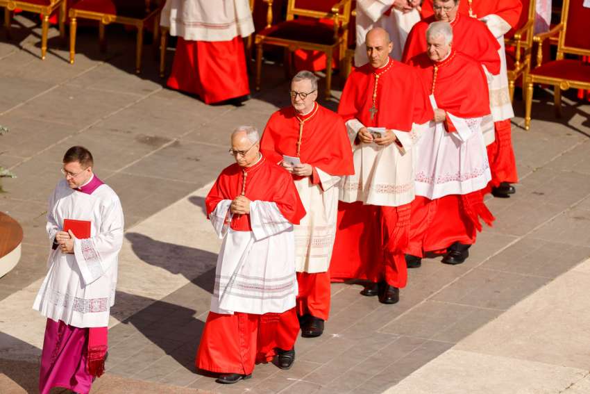 New cardinals line up to receive their red biretta and scroll from Pope Francis during a consistory for the creation of 21 new cardinals in St. Peter&#039;s Square at the Vatican Sept. 30, 2023.
