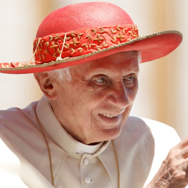 Pope Benedict XVI wears a red hat as he leaves his general audience in St. Peter&#039;s Square at the Vatican June 6.