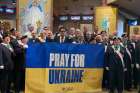 The Knights of Columbus at Calgary’s St. Stephen Protomartyr Ukrainian Catholic Church pray for Ukraine, which was invaded by Russia two years ago.