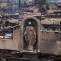 A statue of Mary stands amid the remains of homes destroyed by fire and the effects of Hurricane Sandy in the Breezy Point section of the New York borough of Queens Oct. 30.