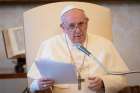 Pope Francis leads his general audience in the library of the Apostolic Palace at the Vatican Aug. 26, 2020. Christians cannot stand idly by and watch as milions of people are deprived of their basic needs because of greed, the pope said.