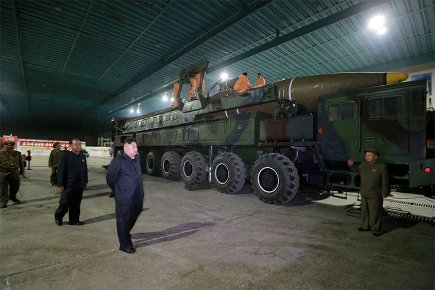  North Korean leader Kim Jong Un inspects the intercontinental ballistic missile Hwasong-14 in this undated photo released by North Korea&#039;s Korean Central News Agency. 