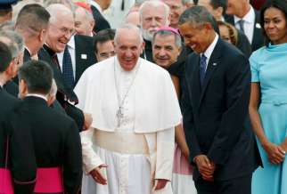 U.S. President Barack Obama and first lady Michelle Obama welcome Pope Francis at Joint Base Andrews as the pope arrives to the United States for the first time Sept. 22.