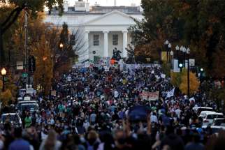 People gather in front of the White House in Washington Nov. 7 after news media declared Democrat Joe Biden the winner of the presidential election.