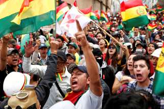 People in La Paz, Bolivia, shout slogans Nov. 9, 2019, during a protest against Bolivia&#039;s President Evo Morales. Morales resigned Nov. 10 after nearly 14 years in office.