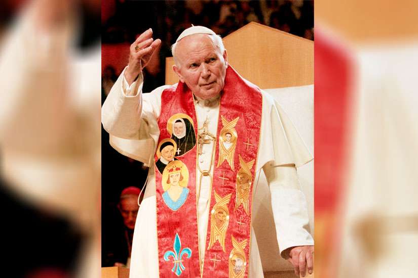 Pope John Paul II meets with a gathering of cheering youths in St. Louis in 1999.