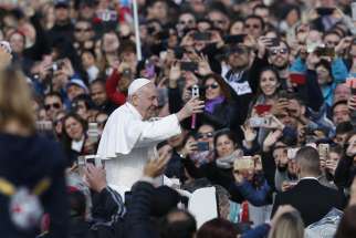 Pope Francis greets the crowd during his general audience in St. Peter&#039;s Square at the Vatican May 1, 2019. 
