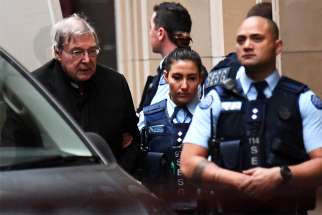 Cardinal George Pell arrives at the Supreme Court of Victoria in Melbourne, Australia, June 5, 2019. Cardinal Pell was at the court for a two-day hearing to appeal his conviction on five counts of child sexual abuse. 