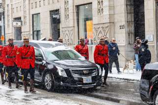 The funeral cortege for former Canadian Prime Minister Brian Mulroney takes to the snowy streets of Montreal on March 23, 2024. Mr. Mulroney’s hearse was accompanied by eight RCMP pallbearers, along with four RCMP officers on horseback, a Canadian Armed Forces escort and guard of honour and the Royal Canadian Air Force Band.