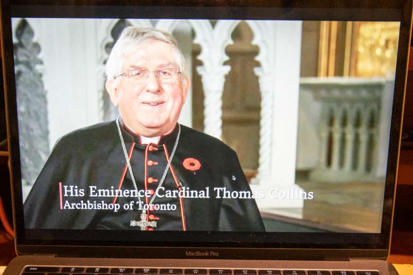 The archbishop of Toronto speaking from St. Michael&#039;s Cathedral at the annual Cardinal&#039;s Dinner.
